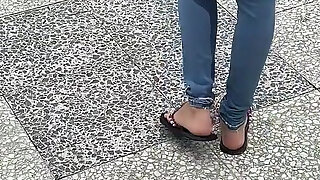 Public Wetting Jeans in Park Near the Beach